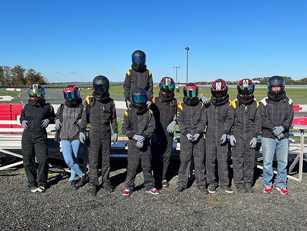 Coast Preparatory High School students suited up and ready to take things full throttle at NJMP.